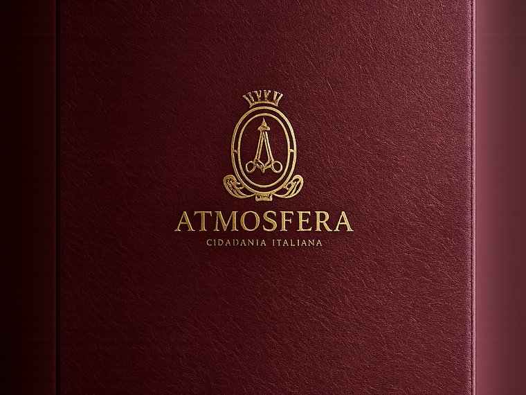 Dossiê Atmosfera em couro bordô com brasão dourado gravado.